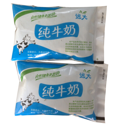 天魯牛奶包裝機(jī)樣品1.jpg